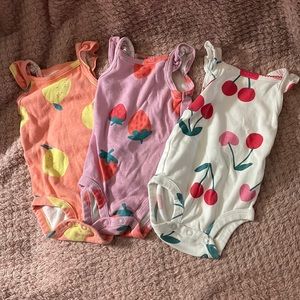 3 Carter’s Summer time fruit onesies